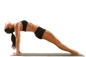 young yoga female doing yogatic exercise