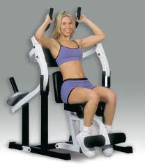 Woman demonstrating ab machines in action