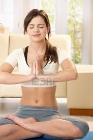 Girl performing yoga at home